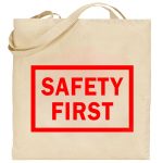 Na obrazku przedstawiono ecru torbę z czerwonym napisem " SAFETY FIRST" - Torba BHP Proresult