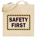 Na obrazku przedstawiono ecru torbę z czrnym napisem " SAFETY FIRST" - Torba BHP Proresult