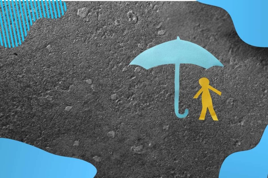 Na obrazku przedstawiony jest człowiek z parasolką na szarym tle - JAK EFEKTYWNIE WDROŻYĆ BEZPIECZEŃSTWO BEHAWIORALNE? Proresult