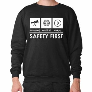 Na obrazku przedstawiona jest czarna bluza z białym napisem SAFETY FIRST- Bluzy BHP Proresult