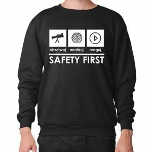 Na obrazku przedstawiona jest czarna bluza z białym napisem SAFETY FIRST- Bluzy BHP Proresult