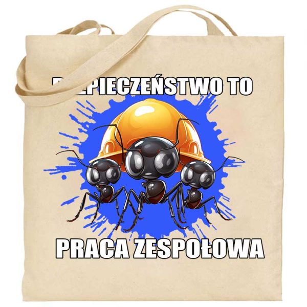Na obrazku przedstawiona jest torba ecru z nadrukowanymi mrówkami i napisem "Bezpieczeństwo to praca zespołowa" - Torby bawełniane BHP Proresult