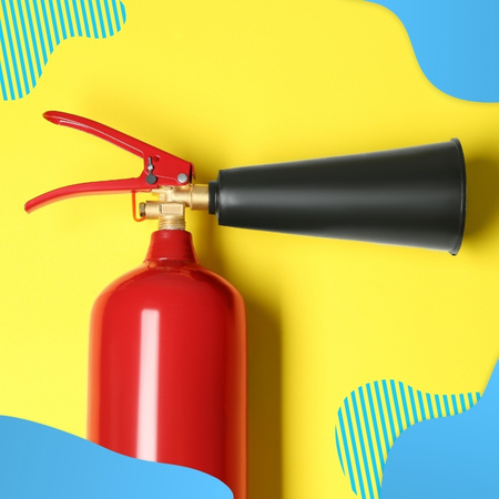 Czerwona gaśnica na żółtym tle - Proresult