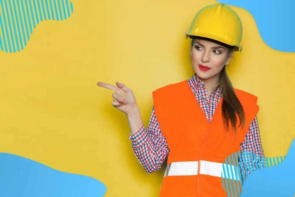 Uśmiechnięta kobieta w pomarańczowej kamizelce - Proresult